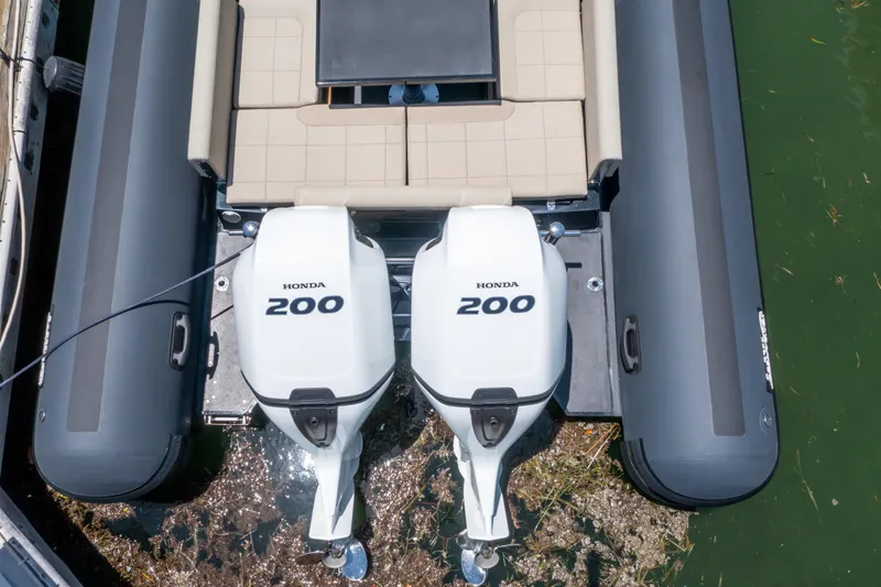  Yacht Photos Pics 2023 Sea Water PHANTOM 280 boat with dual Honda 200 engines, docked on green water.