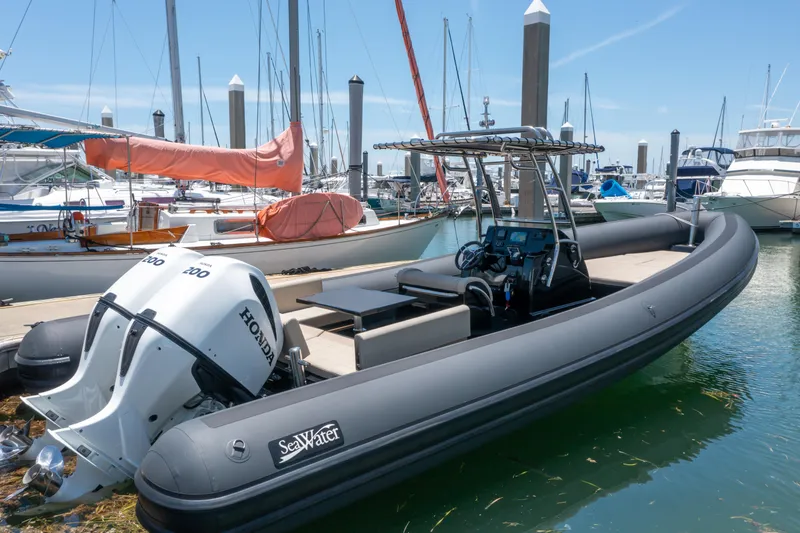  Yacht Photos Pics 2023 Sea Water PHANTOM 280 boat docked in marina with Honda outboard engine.