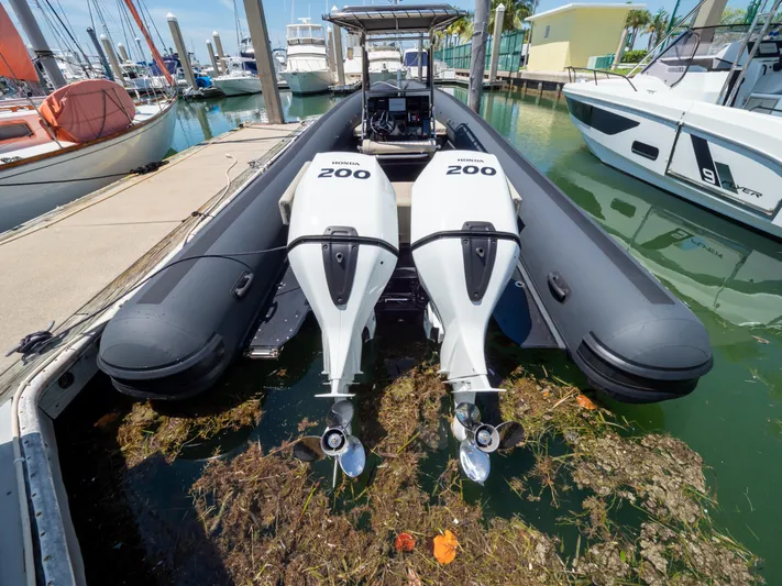  Yacht Photos Pics 2023 Sea Water PHANTOM 280 boat with twin 200 horsepower engines docked in a marina.