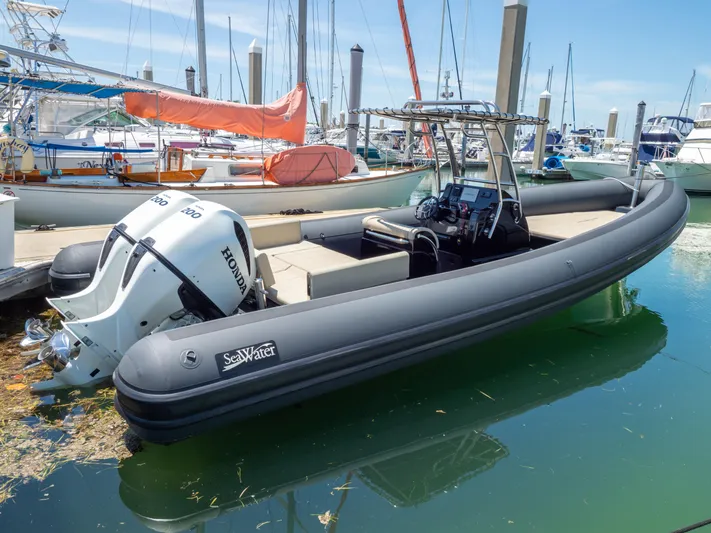  Yacht Photos Pics 2023 Sea Water PHANTOM 280 boat docked, featuring a Honda outboard motor.