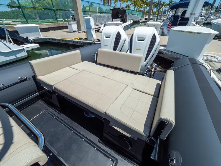  Yacht Photos Pics 2023 Sea Water PHANTOM 280 boat with beige seating and dual engines at a marina.