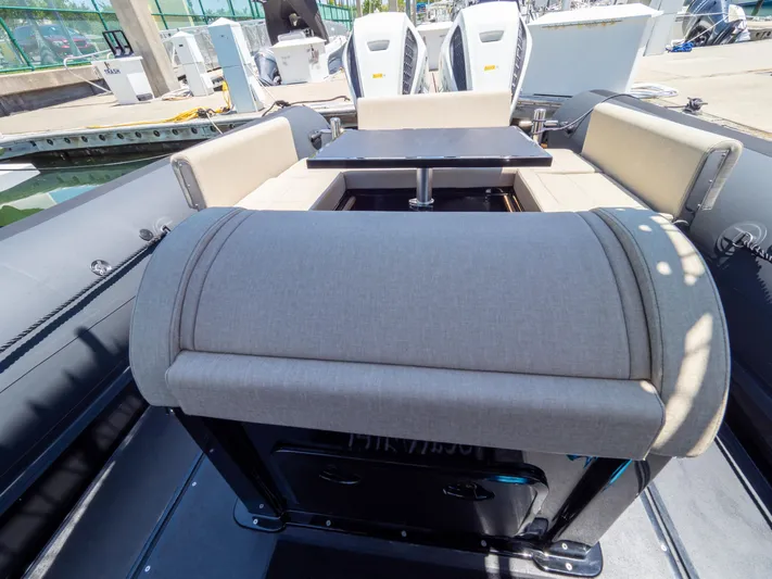  Yacht Photos Pics 2023 Sea Water PHANTOM 280 boat interior with seating and table setup.