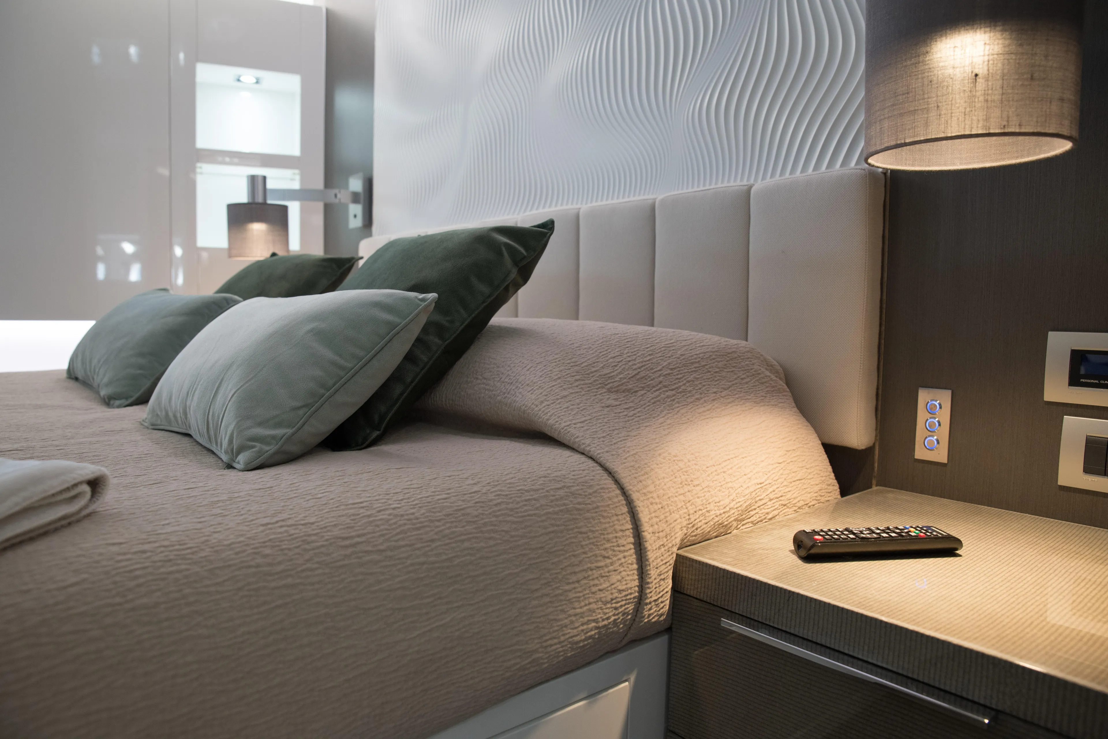 Marcello Yacht Photos Pics Luxurious bedroom interior on 2015 Arcadia Yachts Arcadia 85, featuring modern design and plush bedding.