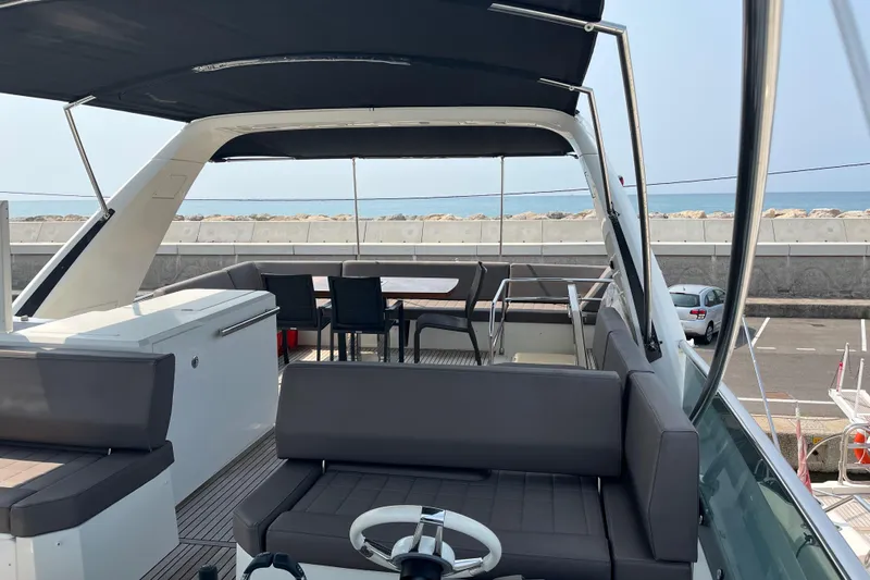  Yacht Photos Pics Flybridge of 2017 Prestige 680 yacht with seating and ocean view.