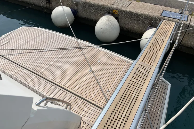  Yacht Photos Pics Prestige 680 yacht deck, 2017 model, docked with fenders and gangway.