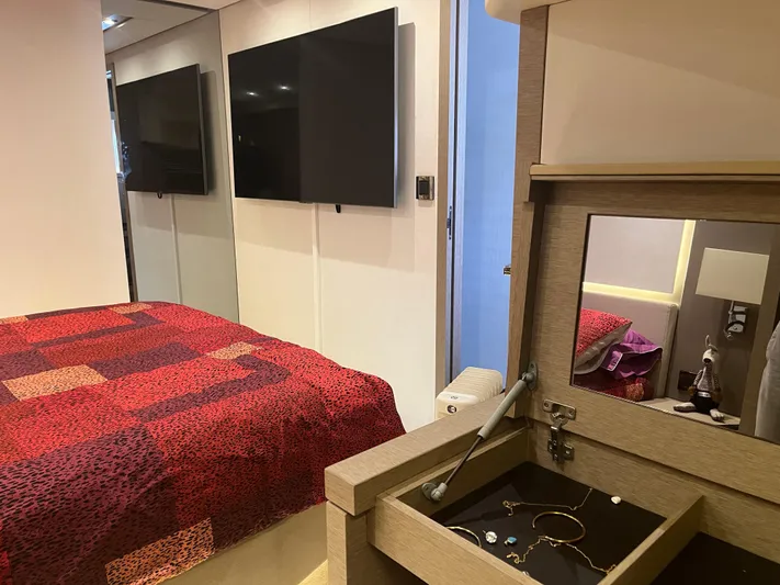  Yacht Photos Pics Luxurious bedroom interior of 2017 Prestige 680 yacht with modern decor and amenities.