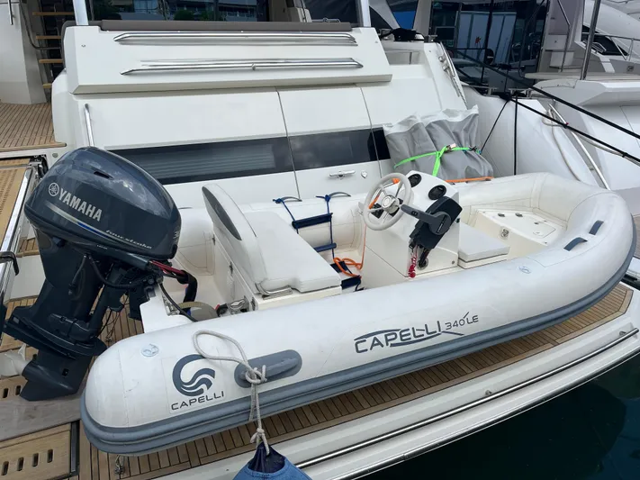  Yacht Photos Pics Inflatable Capelli 340 LE boat with Yamaha motor on Prestige 680 yacht, 2017 model.