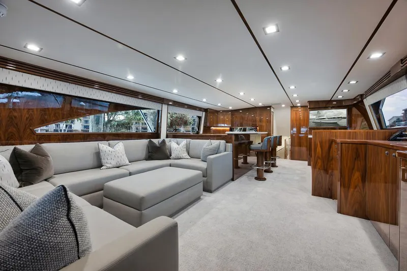  Yacht Photos Pics Luxurious interior of 2019 Viking 80 Convertible yacht with modern furnishings.