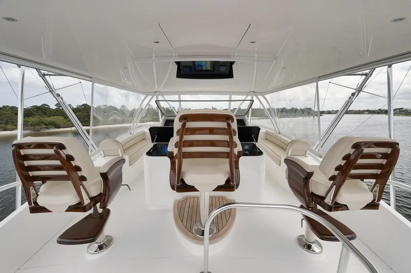  Yacht Photos Pics Luxurious 2019 Viking 80 Convertible yacht interior with elegant seating and panoramic views.
