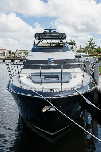 No Name 66 Marquis Yacht Photos Pics 2017 Marquis 660 Sport Yacht docked, showcasing sleek design and luxury features.