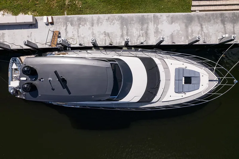 No Name 66 Marquis Yacht Photos Pics Overhead view of 2017 Marquis 660 Sport Yacht docked at a marina.