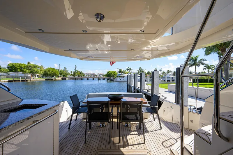 No Name 66 Marquis Yacht Photos Pics Luxurious 2017 Marquis 660 Sport Yacht deck with waterfront view and elegant seating area.
