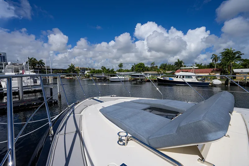 No Name 66 Marquis Yacht Photos Pics 2017 Marquis 660 Sport Yacht docked in a sunny marina setting.