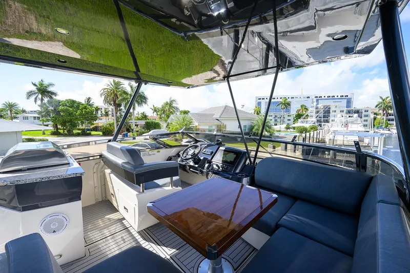 No Name 66 Marquis Yacht Photos Pics Luxurious 2017 Marquis 660 Sport Yacht interior with sleek seating and modern controls.