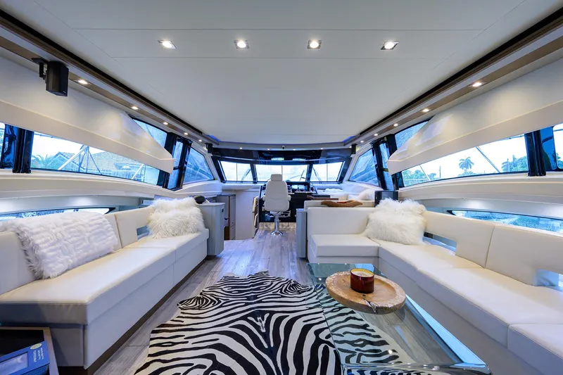 No Name 66 Marquis Yacht Photos Pics Luxurious interior of 2017 Marquis 660 Sport Yacht with plush seating and zebra rug.