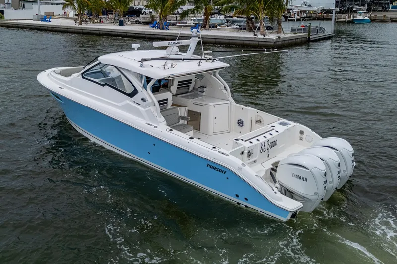  Yacht Photos Pics 2023 Pursuit DC 365 Dual Console boat with triple Yamaha engines on the water.