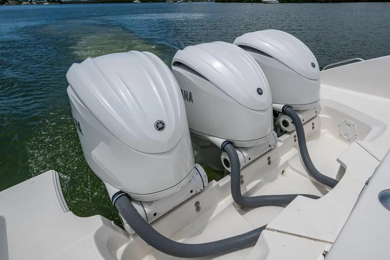  Yacht Photos Pics Triple Yamaha outboard engines on a 2023 Pursuit DC 365 Dual Console boat.