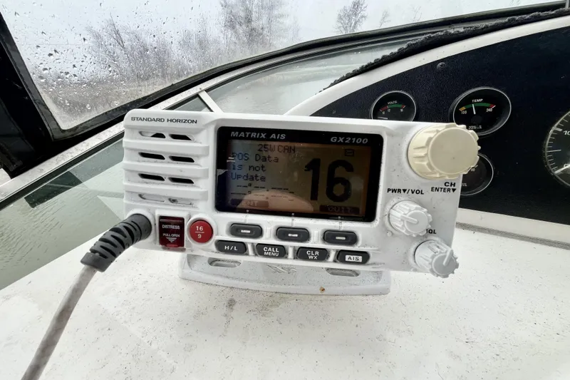  Yacht Photos Pics Standard Horizon GX2100 radio on 1996 Bayliner 3988 Motoryacht dashboard, displaying channel 16.
