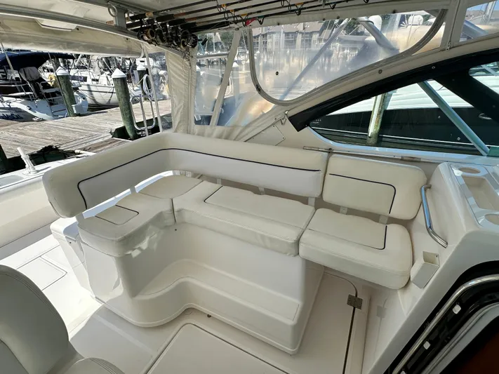  Yacht Photos Pics 2005 Tiara Yachts 3600 Open interior with white seating and fishing rod holders.