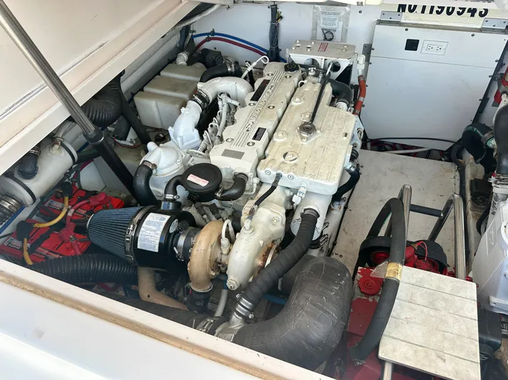 Yacht Photos Pics Engine compartment of a 2005 Tiara Yachts 3600 Open, showcasing detailed mechanical components.