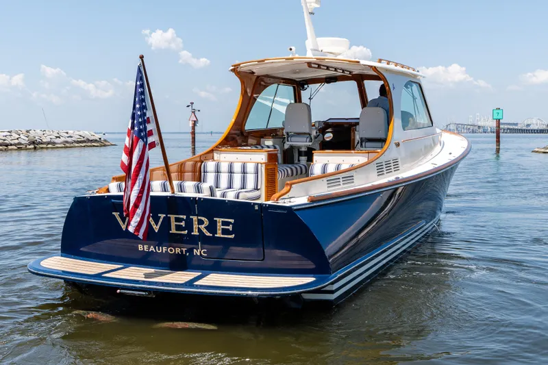 Vivere Yacht Photos Pics 2015 Hinckley Picnic Boat 37 MKIII on water, American flag, Beaufort, NC.