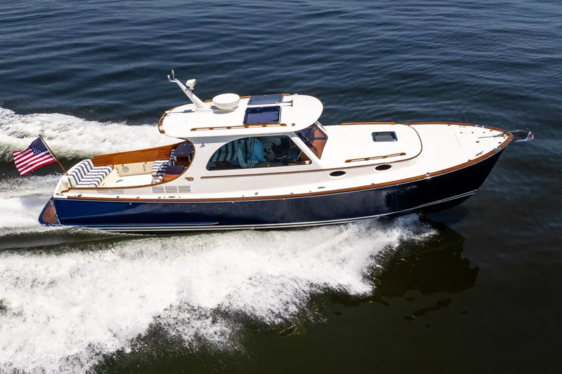 Vivere Yacht Photos Pics 2015 Hinckley Picnic Boat 37 MKIII cruising on open water.