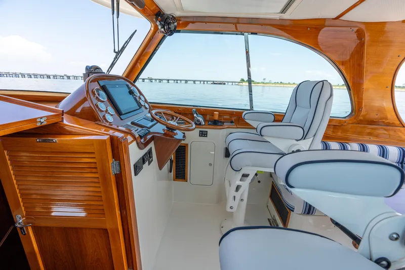 Vivere Yacht Photos Pics Interior of 2015 Hinckley Picnic Boat 37 MKIII with elegant helm and seating.