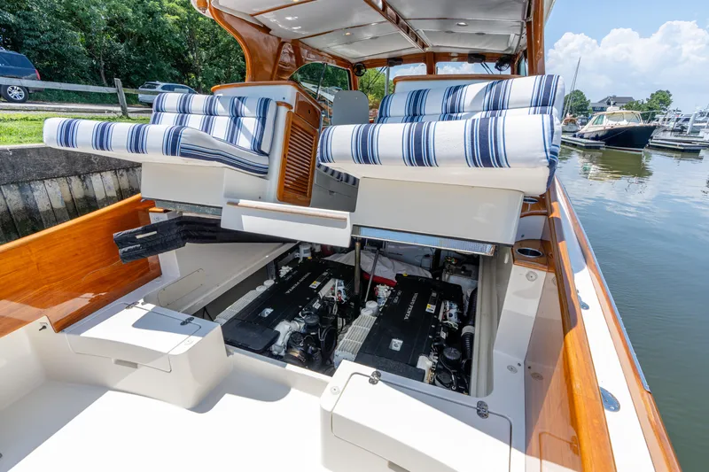 Vivere Yacht Photos Pics 2015 Hinckley Picnic Boat 37 MKIII with open engine compartment and striped seating.
