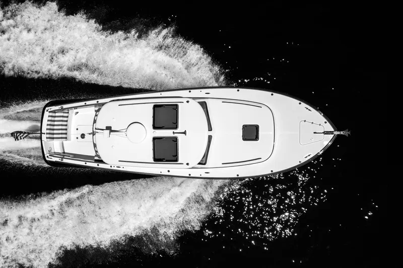 Vivere Yacht Photos Pics Top view of 2015 Hinckley Picnic Boat 37 MKIII cruising on water.