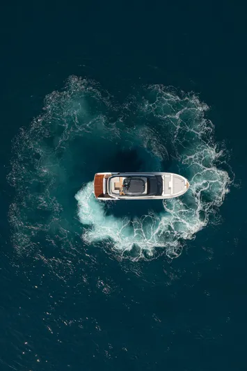  Yacht Photos Pics Aerial view of 2024 Astondoa AS5 yacht making waves in the ocean.