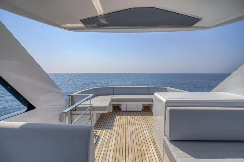  Yacht Photos Pics 2024 Astondoa AS5 yacht deck with ocean view and modern seating.