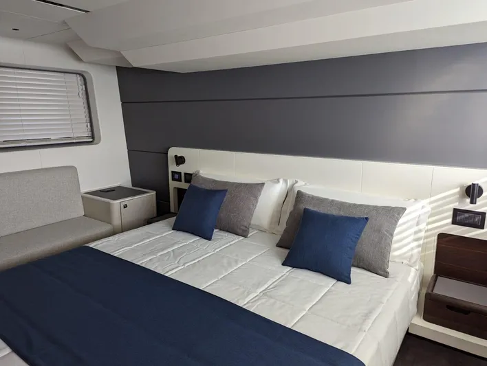  Yacht Photos Pics Luxurious bedroom interior of 2024 Astondoa AS5 yacht with modern design.
