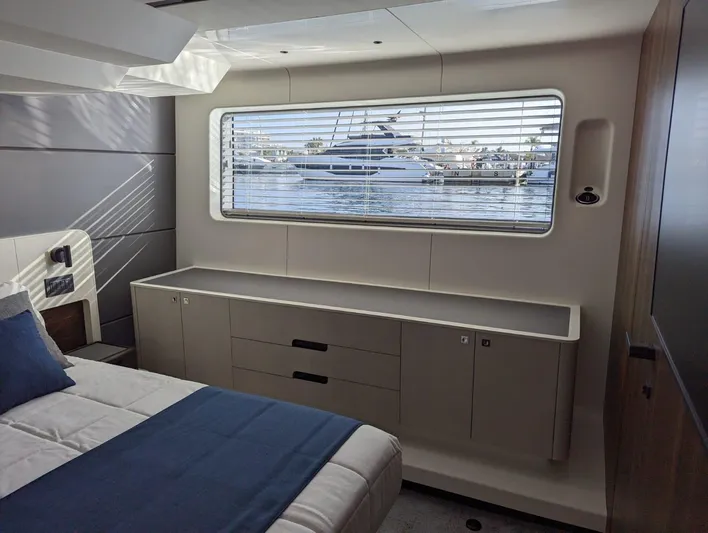  Yacht Photos Pics Luxurious bedroom interior of 2024 Astondoa AS5 yacht with waterfront view.