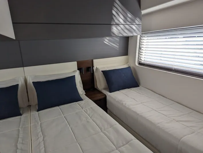  Yacht Photos Pics 2024 Astondoa AS5 twin bed cabin with modern decor and natural light.