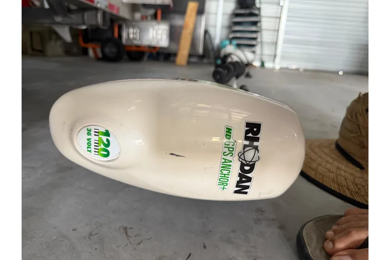  Yacht Photos Pics Rhodan HD GPS Anchor on 2008 Contender 31 Cuddy boat in garage setting.