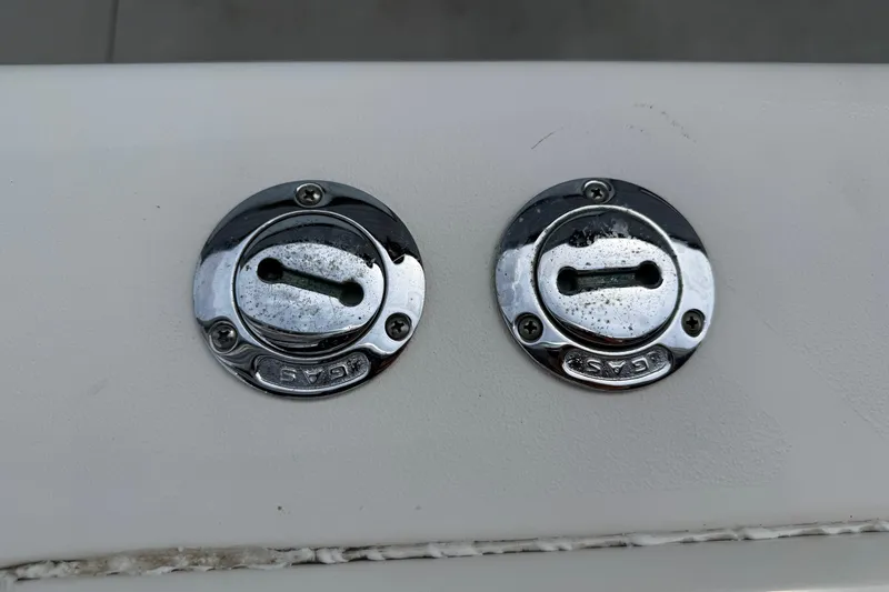  Yacht Photos Pics Chrome gas caps on a 2008 Contender 31 Cuddy boat.