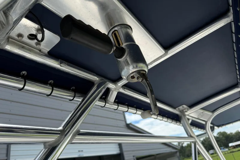  Yacht Photos Pics 2008 Contender 31 Cuddy boat T-top with rod holders and mounted equipment.