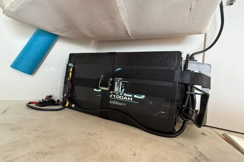  Yacht Photos Pics Battery setup in a 2008 Contender 31 Cuddy boat, featuring a lithium iron phosphate battery.