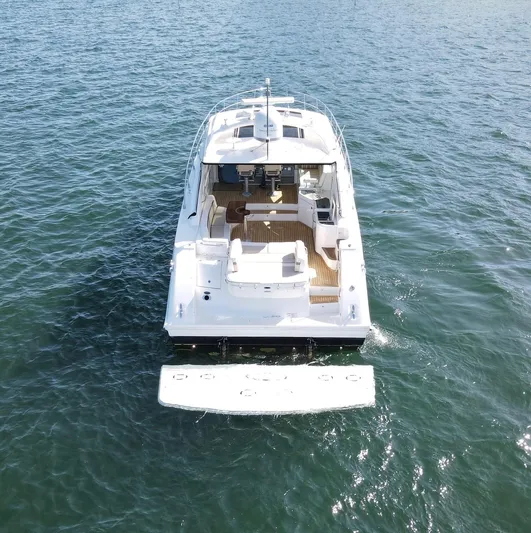 Costas Yacht Photos Pics 2015 Sea Ray 540 Sundancer yacht on open water, aerial view.