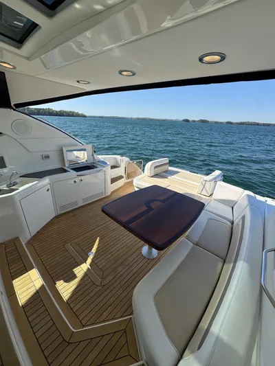 Costas Yacht Photos Pics Luxurious 2015 Sea Ray 540 Sundancer yacht with spacious deck and scenic ocean view.