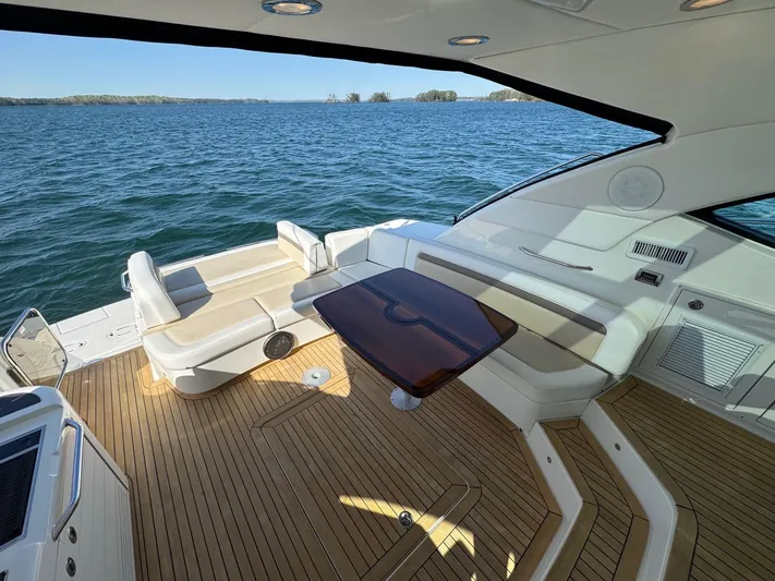 Costas Yacht Photos Pics Luxurious 2015 Sea Ray 540 Sundancer yacht with spacious deck and elegant seating.