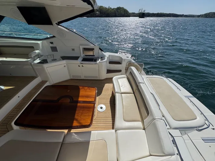 Costas Yacht Photos Pics Luxurious 2015 Sea Ray 540 Sundancer yacht with spacious deck and scenic water view.