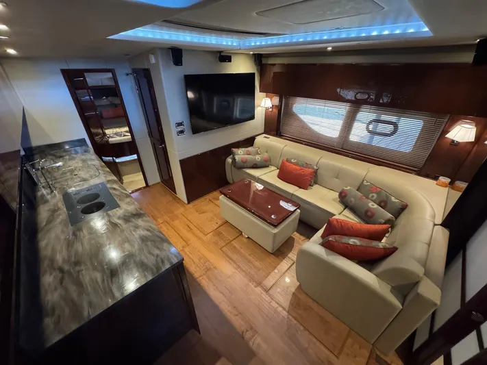 Costas Yacht Photos Pics Luxurious interior of 2015 Sea Ray 540 Sundancer yacht with modern furnishings and elegant design.