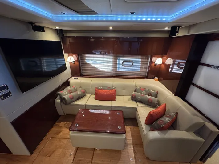 Costas Yacht Photos Pics Luxurious interior of 2015 Sea Ray 540 Sundancer yacht with plush seating and modern decor.