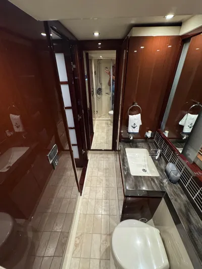 Costas Yacht Photos Pics Luxurious bathroom interior of 2015 Sea Ray 540 Sundancer yacht with modern fixtures.