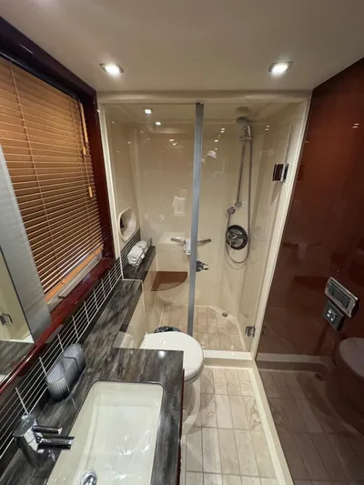 Costas Yacht Photos Pics Luxurious bathroom in 2015 Sea Ray 540 Sundancer yacht with modern fixtures and shower.