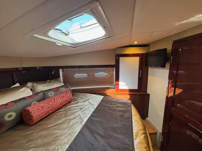 Costas Yacht Photos Pics Luxurious cabin interior of 2015 Sea Ray 540 Sundancer yacht with skylight and TV.