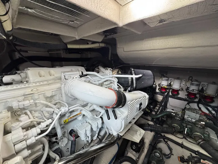 Costas Yacht Photos Pics Engine room of 2015 Sea Ray 540 Sundancer, showcasing detailed mechanical components.