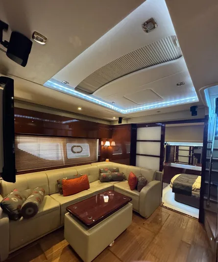 Costas Yacht Photos Pics Luxurious interior of 2015 Sea Ray 540 Sundancer yacht with modern seating and ambient lighting.