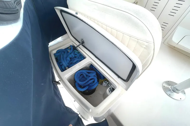  Yacht Photos Pics Storage compartment on 2003 Grady-White Express 330 boat with blue ropes inside.